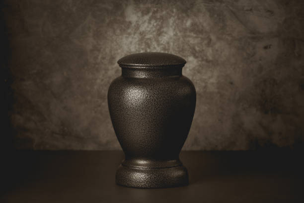 Cremation Urn Cremation urn with sepia toning ash stock pictures, royalty-free photos & images