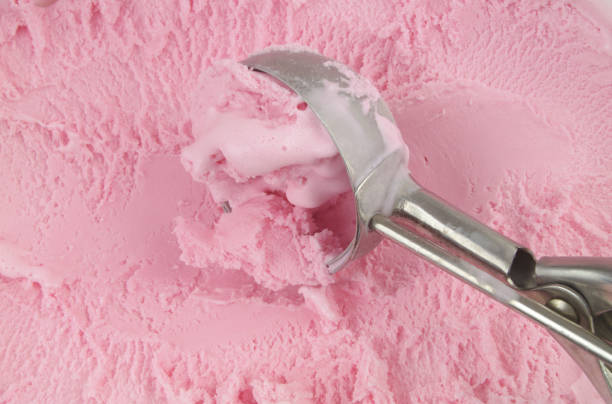 istock Chocolate ice cream with scoop 1395346597