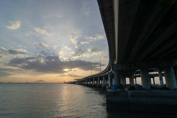 istock Penang Bridge in sunrise morning 1395348347