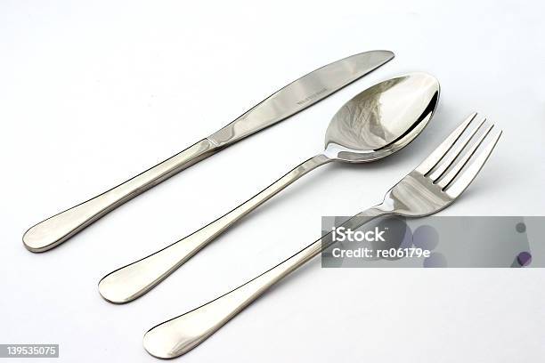 Knife Spoon And Fork On White Background Stock Photo - Download Image Now - Diminishing Perspective, Fork, White Background