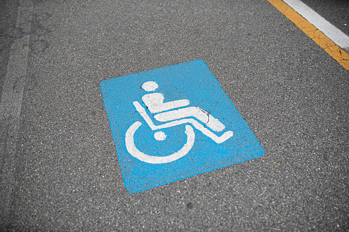 Road Sings: road sign indicating a parking space reserved for a disabled person