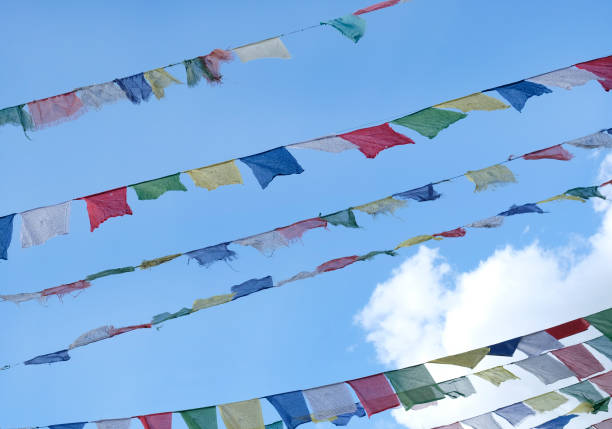 istock Tibetan prayer flags flying in the wind 1395351955