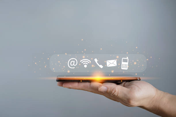 istock Contact us or Customer support hotline people connect. Businessman using smartphone contact icons 1395354448