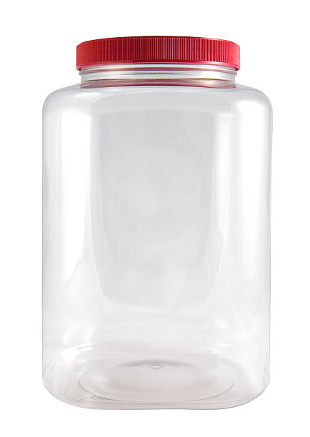 Clear Plastic Jar - Red Lid stock photo