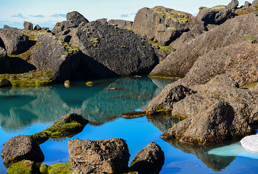 The big boulders and turquoise ponds of beautiful Storurd valley, East Fjords, Iceland