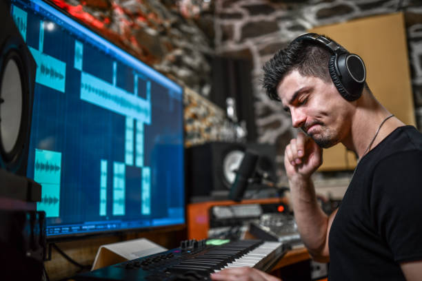 istock Focused Producer Working On New Song 1395364470