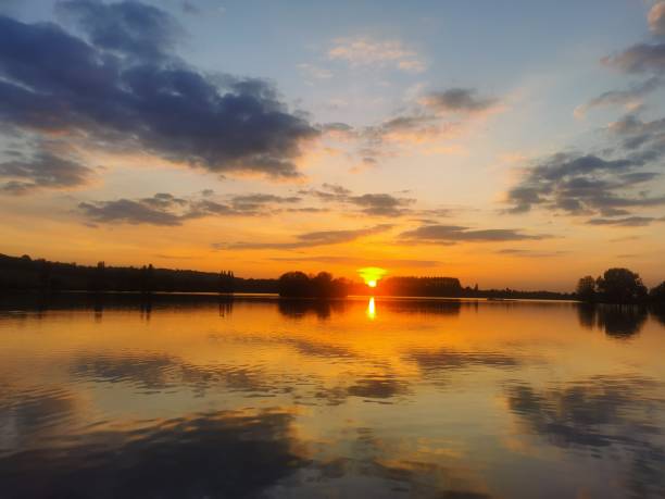 istock Sunset and reflection on the lake 1395365659