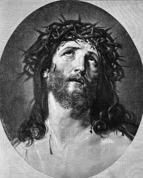 istock Jesus with the crown of thorns looking up 1395365922