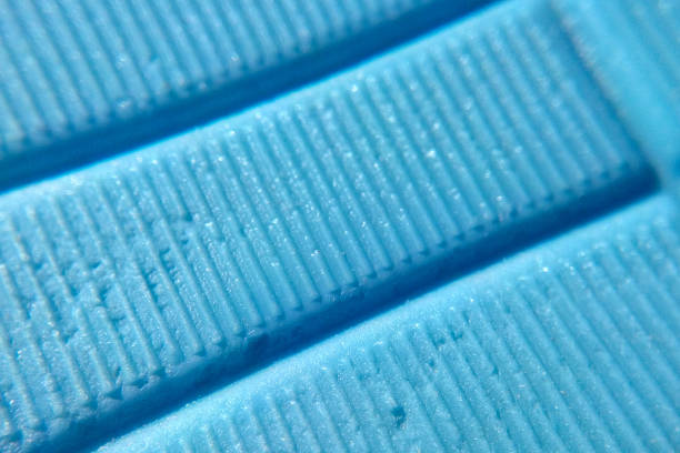 Texture of blue rough plastic close-up stock photo