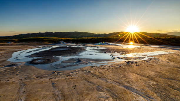 The mud volcanoes of Berca in Romania The mud volcanoes of Berca in Romania mud volcano stock pictures, royalty-free photos & images