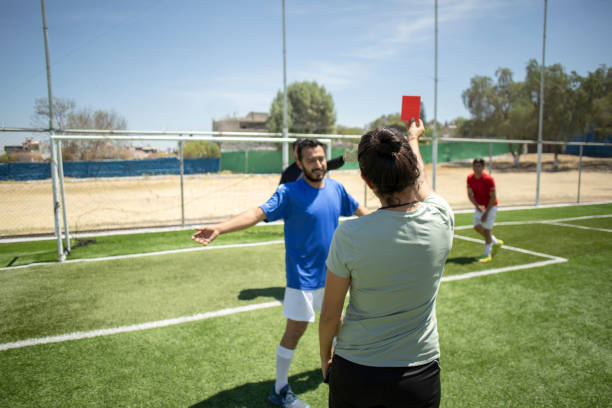 istock Friends playing soccer 1395368674