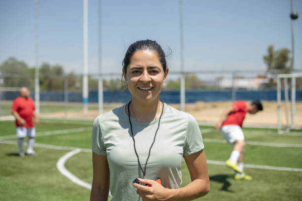 istock Friends playing soccer 1395368828