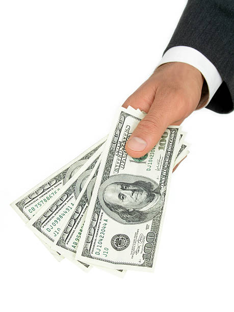 istock Businessman’s Hand Offering Money 139536899