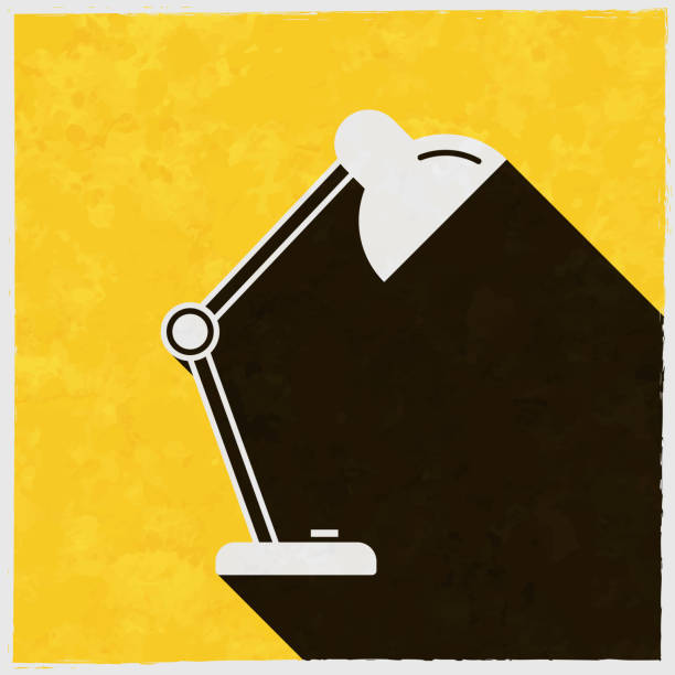 Desk Lamp. Icon with long shadow on textured yellow background Icon of "Desk Lamp" in a trendy vintage style. Beautiful retro illustration with old textured yellow paper and a black long shadow (colors used: yellow, white and black). Vector Illustration (EPS10, well layered and grouped). Easy to edit, manipulate, resize or colorize. Vector and Jpeg file of different sizes. light-switch-clip-art stock illustrations