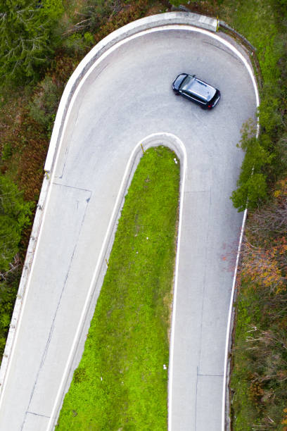 istock drone view on curved road of pass road 1395369352