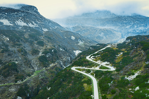 aerial view on winding road of the san Bernardino pass in the Swiss alps in the Graubünden canton