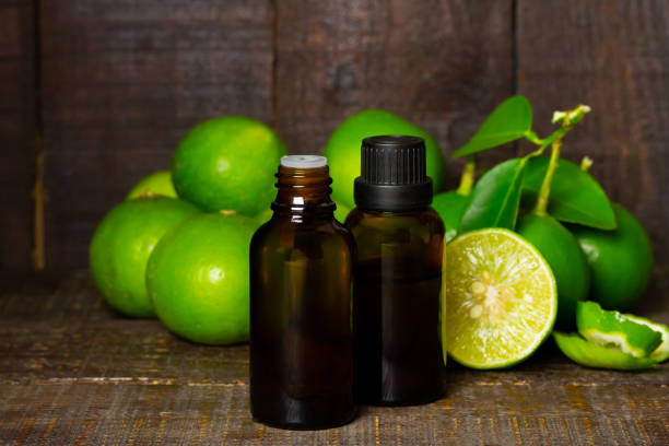 istock Lime essential oil in glass bottle for healtyh. 1395370013