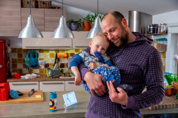 istock Father and son portrait in the kitchen 1395370696