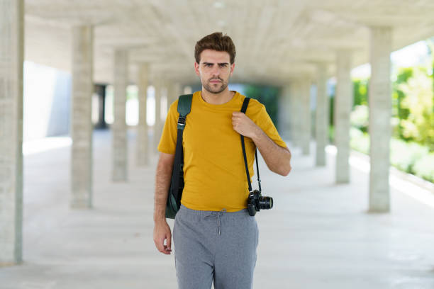 Cool young man with a backpack