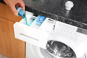 Add the right amount of detergent for the washing machine