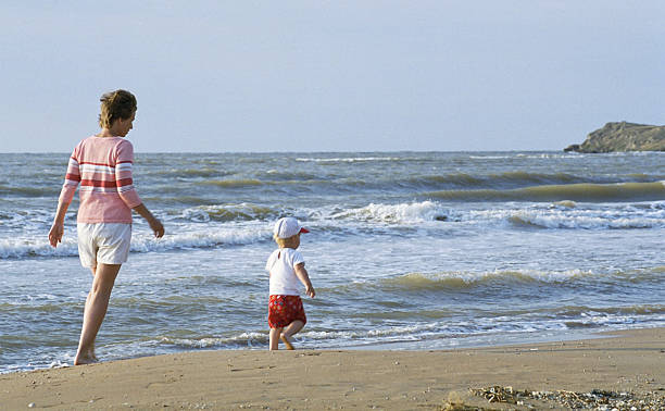 istock Mother and child on the beach 139537864