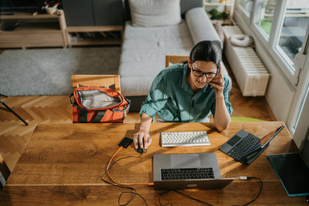 istock Woman working on laptop at home 1395382570