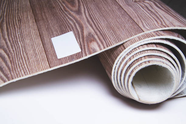 istock Waterproofness of linoleum. Waterproof linoleum in the kitchen. Sample roll. 1395386928