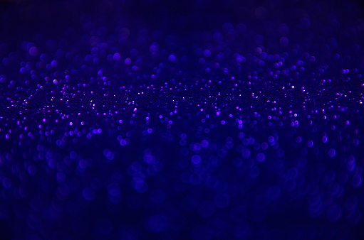 Festive background. Blue background with bokeh. Blurred background. Abstraction circles.