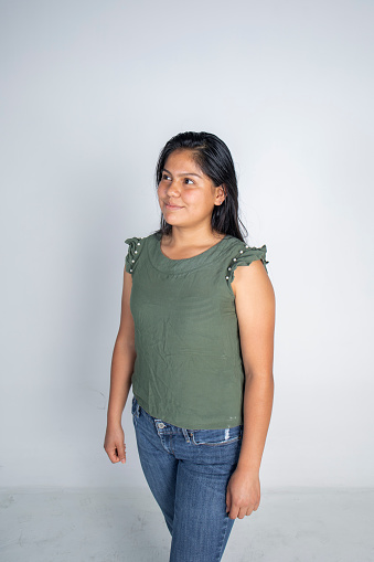 Latino teenager portrait, in studio