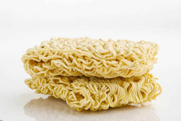 istock Raw Instant noodles. Close up instant noodles texture for background. 1395390431
