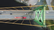 istock Traffic On Suspension Bridge 1395391189