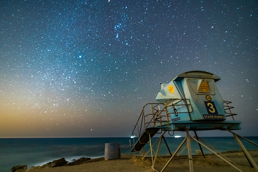 Long exposure astrophotography of a lifeguard tower in Los Angeles