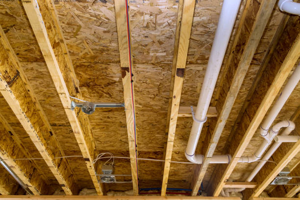 istock Interior view of a new house under construction framing the beams stick 1395395132