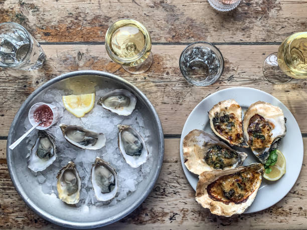 istock Gourmet luxury lunch. eating oysters. 1395399122