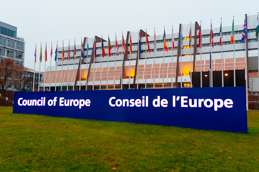 STRASBOURG, FRANCE - Decembre, 2021: Council of Europe Strasbourg. EU building. EU Flags.