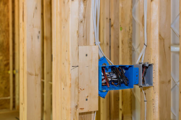 istock Installing electric sockets on the wall new home new home construction 1395400550