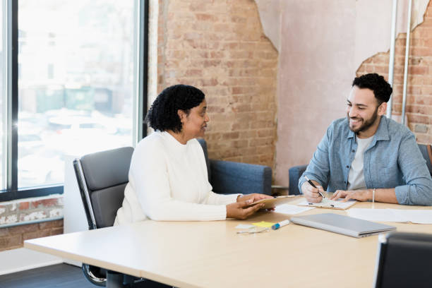 istock Colleagues review each other's completed research 1395400692