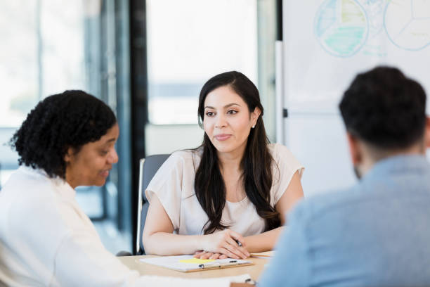 istock Diverse business people meet together 1395401481