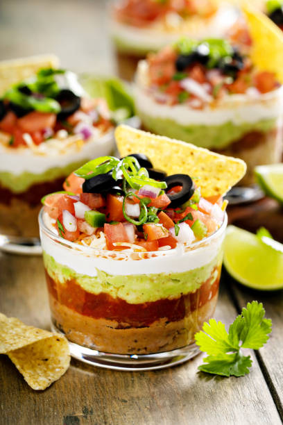 istock Seven layer dip in individual cups, mexican appetizer 1395404215