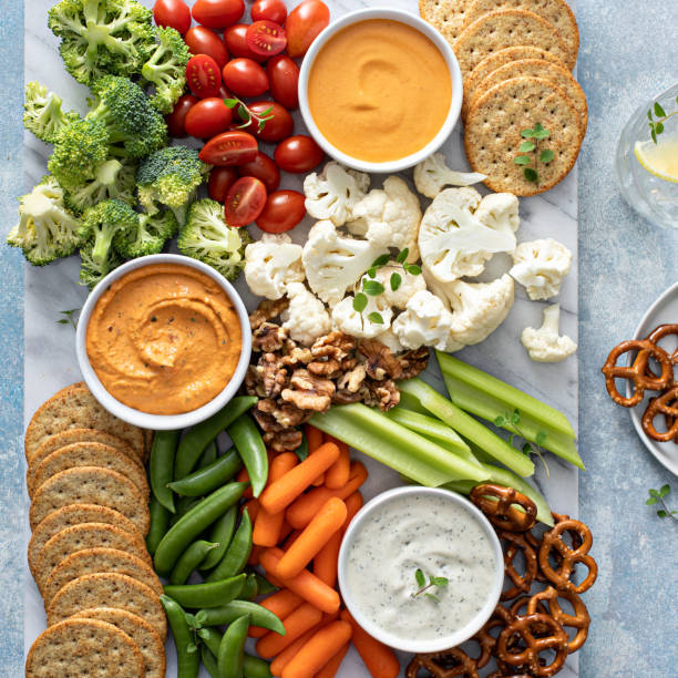 istock Plant based snack board with vegetables and crackers 1395404218