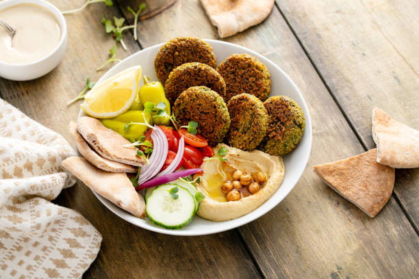 istock Baked falafel bowl with hummus and vegetables 1395404219