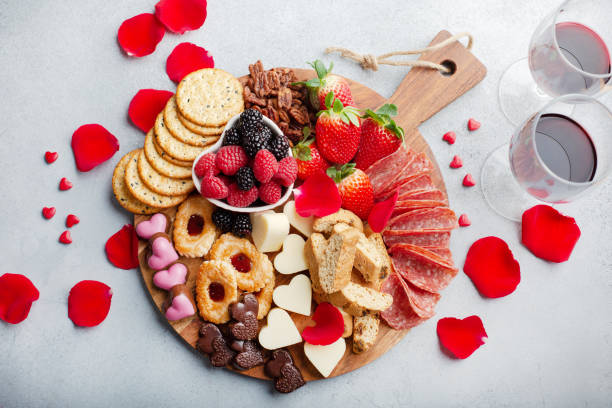 istock Cheese plate for Valentines day with snacks and fruit 1395404282