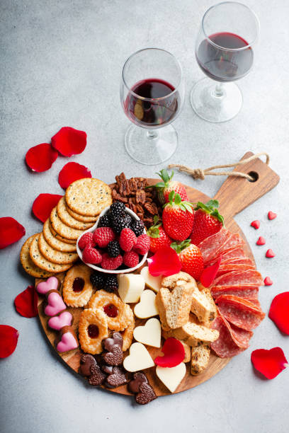 istock Cheese plate for Valentines day with snacks and fruit 1395404283