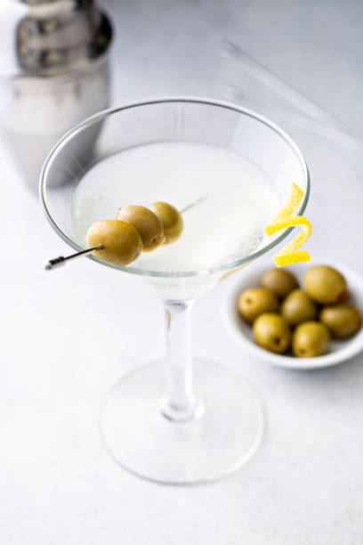 istock Classic lemon drop martini with olives and lemon 1395404303