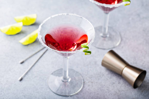 istock Traditional Cosmopolitan martini with sugar rim and garnish 1395404310
