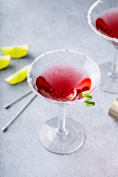 istock Traditional Cosmopolitan martini with sugar rim and garnish 1395404312