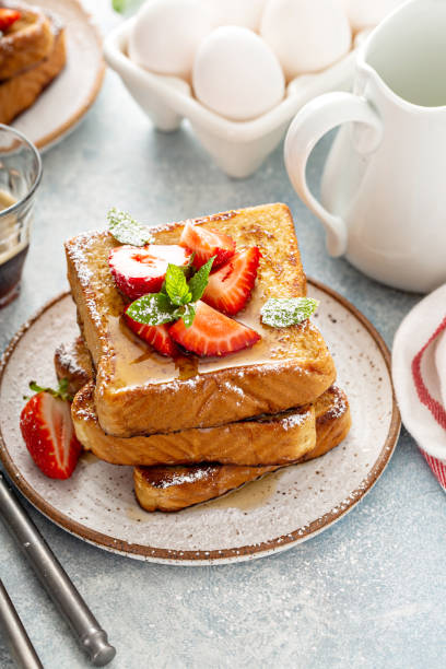 istock French toasts with strawberry and powdered sugar 1395404324