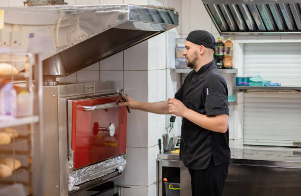 istock Chef grills vegetables in the restaurant kitchen 1395410958