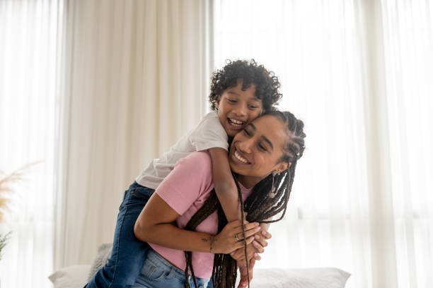 istock Happy mother and son on mother's day 1395411640