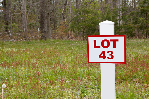 Building lot sign at new homestead development.